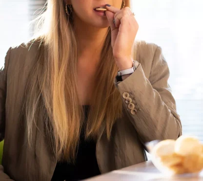 woman eating herbalife protein chips