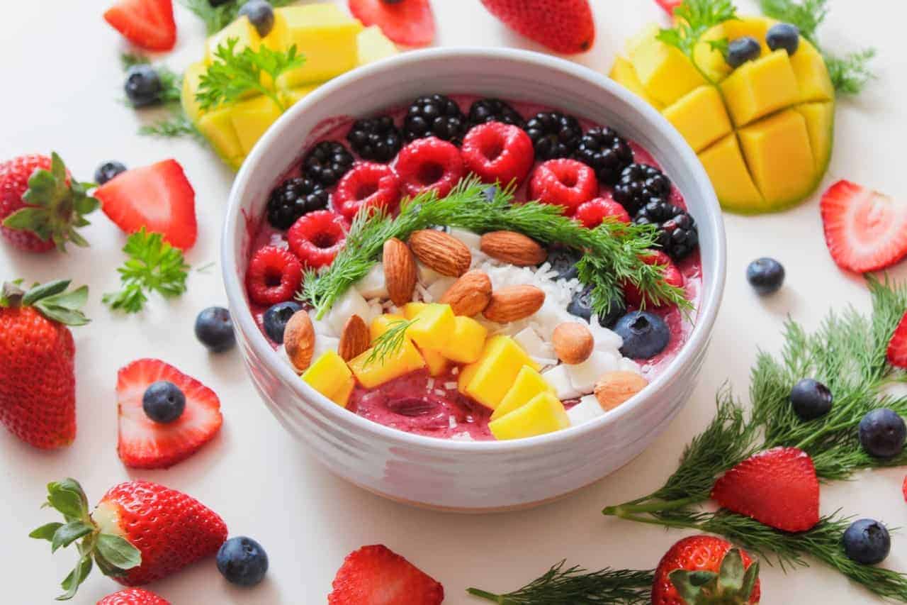 Bowl of healthy breakfast fruit and nuts